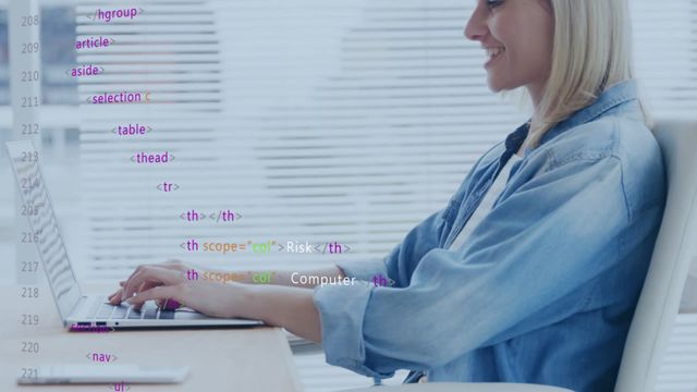 Woman in denim jacket working on coding in a modern, bright office. Hands on laptop, smiling. Could be used in technology, programming tutorials, digital working environment, office productivity.