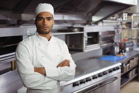 Confident Chef in Modern Restaurant Kitchen