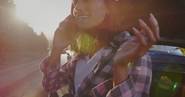 Woman making phone call while traveling in the countryside - Download Free Stock Images Pikwizard.com