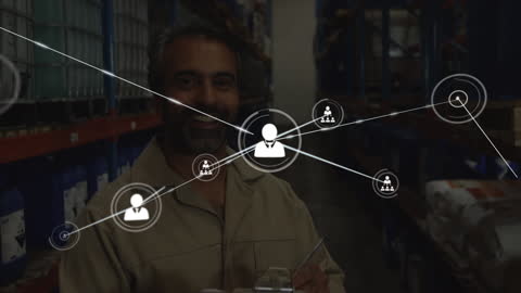 Warehouse Worker Connected by Digital Network Graphics