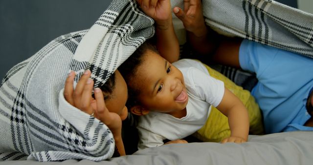 Joyful Family Playing Under Blanket, Mother And Child Bonding At Home - Download Free Stock Images Pikwizard.com