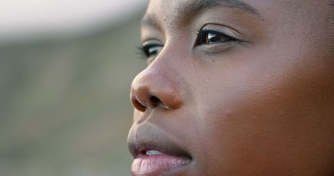 Contemplative Young Woman Gazing Outdoors - Download Free Stock Images Pikwizard.com