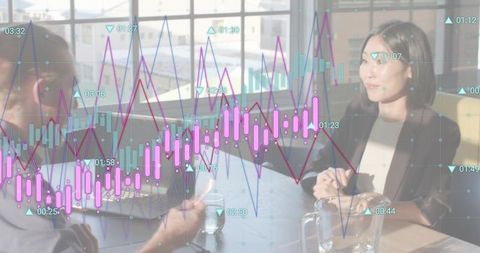 Business partners discussing strategy with data overlay, candlestick charts and analytics