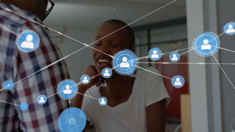 Business Professionals Engaged in Digital Networking