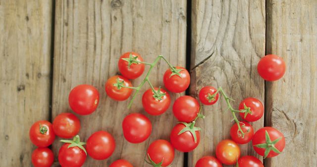 Image of fresh cherry tomatoes with copy space over wooden background - Download Free Stock Photos Pikwizard.com