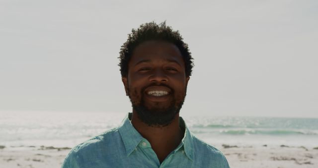 Smiling Man Enjoying a Day at the Beach - Download Free Stock Images Pikwizard.com