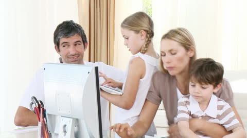 Parents Assisting Children with Homework and Computer Learning