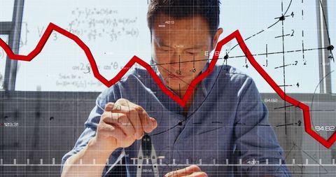Financial expert analyzing data with graph overlay