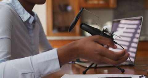 African American Woman Singing at Home Studio