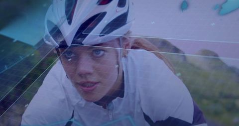 Determined female cyclist with innovative digital overlay