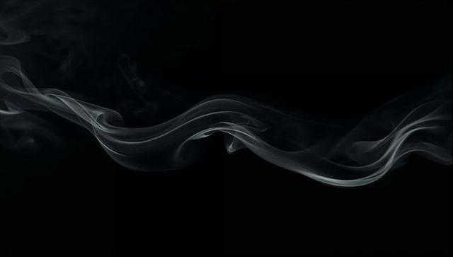 Ethereal gray smoke ribbons flowing across black background for minimalist abstract design