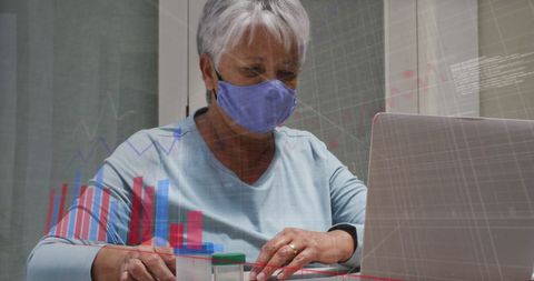 Senior Woman Analyzing Data on Laptop with Face Mask - Download Free Stock Images Pikwizard.com