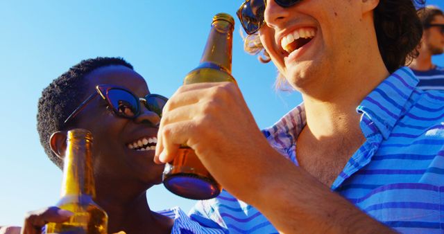 Friends Enjoying Beers on a Sunny Day Outdoors - Download Free Stock Images Pikwizard.com