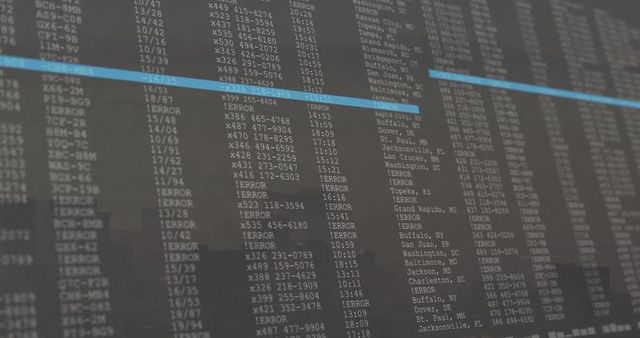 Computer monitor displaying data logs in control room setting