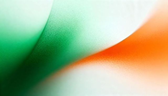 Flowing green and orange pigment gradient creating soft abstract texture for design