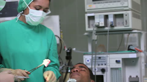Surgeon Performing Complex Procedure in Modern Operating Room