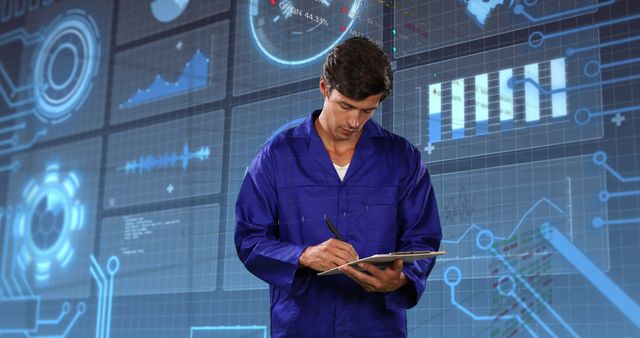 Male Engineer Analyzing Data on Touchscreen Interface with Digital Graphics - Download Free Stock Images Pikwizard.com