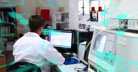 Scientist Analyzing Data in Laboratory with Computer Technology - Download Free Stock Images Pikwizard.com