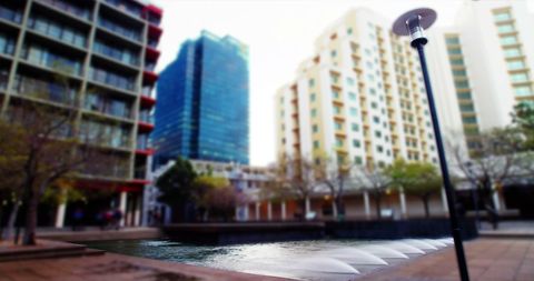 Urban Architecture Featuring Contemporary Fountain in Modern City