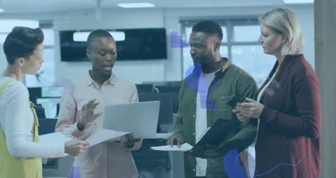 Diverse Team Discussing Business Strategies with Digital Interface