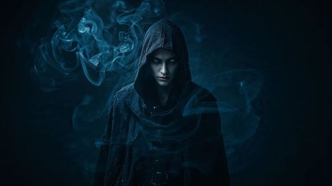Mysterious hooded assassin figure in misty blue atmosphere