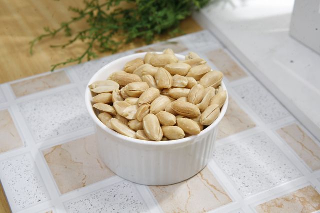Peanuts in White Ceramic Bowl - Download Free Stock Photos Pikwizard.com