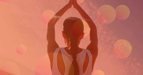 Serene Woman Meditating at Sunset in Mountain Pose