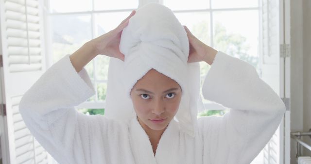 Woman with Towel on Head and Bathrobe in Bright Bathroom - Download Free Stock Images Pikwizard.com