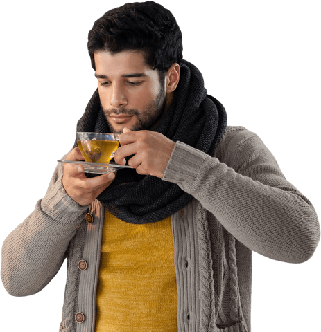man sipping lemon tea in warm outfit with transparent background - Download Free Stock Videos Pikwizard.com