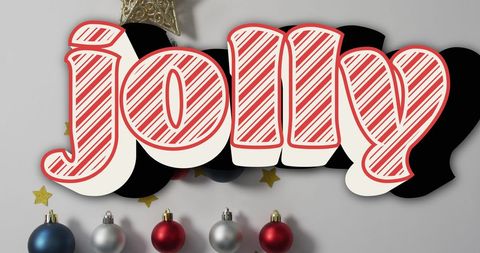 Jolly text over christmas baubles for festive design