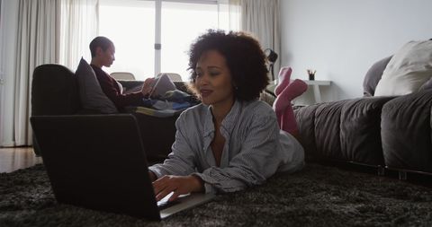 Lesbian Couple Relaxing with Technology at Home - Download Free Stock Images Pikwizard.com