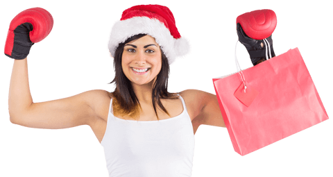 Festive Woman Wearing Boxing Gloves and Santa Hat Holding Shopping Bag Transparent