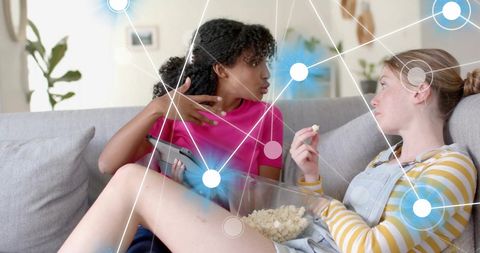 Diverse women engaging with technology and ai connections