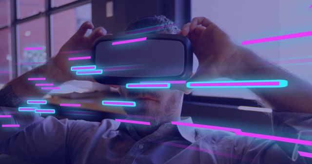 Man Experiencing Virtual Reality with VR Headset and Neon Lights - Download Free Stock Images Pikwizard.com