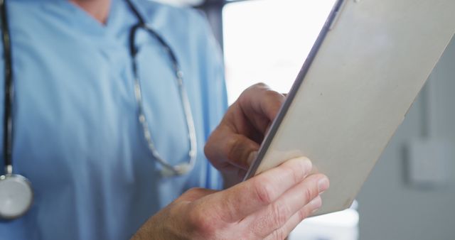 Healthcare Professional Holding Tablet Using Stethoscope - Download Free Stock Photos Pikwizard.com