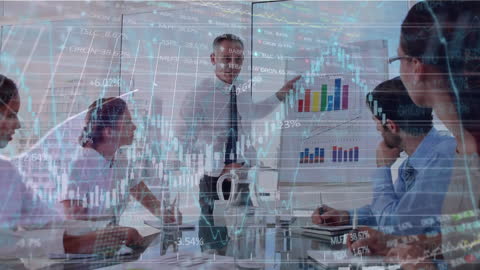 Business Planning Meeting with Financial Data Overlay