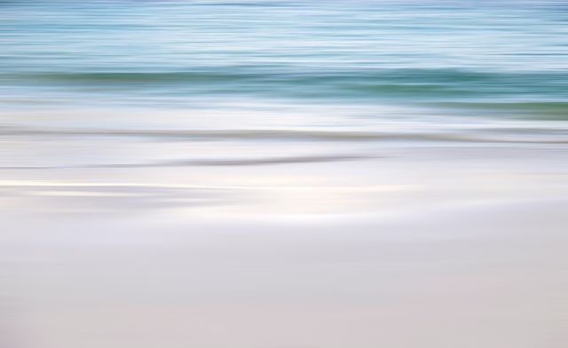 Serene Abstract Ocean Waves on Blurred Beach Scene - Download Free Stock Photos Pikwizard.com