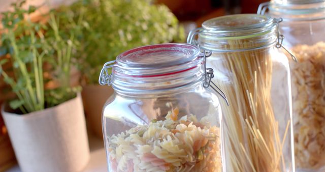 Dried Pasta in Glass Jars on Sunlit Kitchen Counter - Download Free Stock Images Pikwizard.com