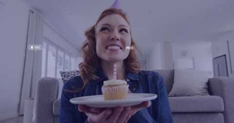 Woman Celebrating Birthday at Home with Social Media Interaction