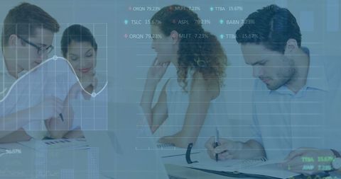 Colleagues Analyzing Stock Market Data in Office Setting - Download Free Stock Images Pikwizard.com