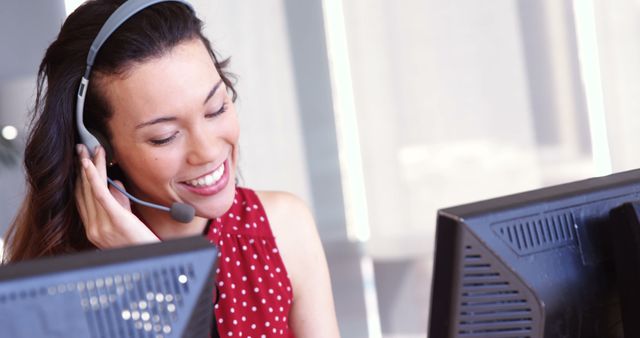 Smiling Customer Service Representative Wearing Headset Working on Computer - Download Free Stock Images Pikwizard.com