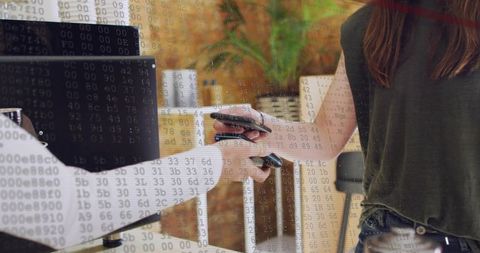 Handing Contactless Card Terminal at Checkout with Digital Data Overlay and Mobile Pay