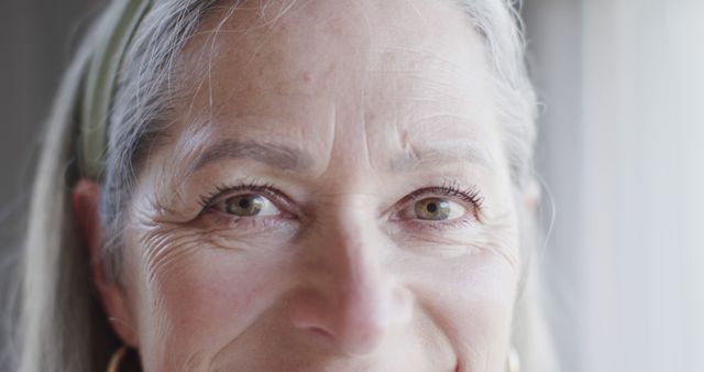 Close-up of Senior Woman with Green Eyes Smiling - Download Free Stock Images Pikwizard.com