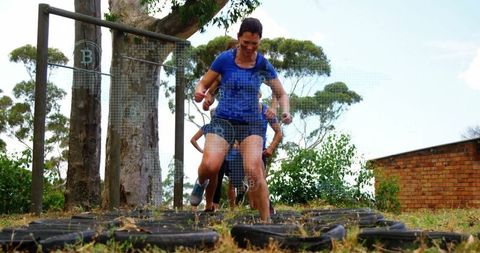 outdoor team building with tire agility training in park - Download Free Stock Images Pikwizard.com
