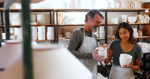 Artists Enjoy Craftsmanship in Creative Pottery Workshop - Download Free Stock Images Pikwizard.com