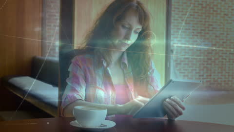 Woman Using Tablet in Modern Cafe with Tech Overlay