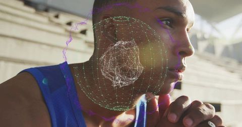 Gazing athlete contemplating strategy with ar neural hologram overlay on stadium bleachers