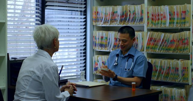 Senior Patient Consulting with Doctor in Office - Download Free Stock Images Pikwizard.com