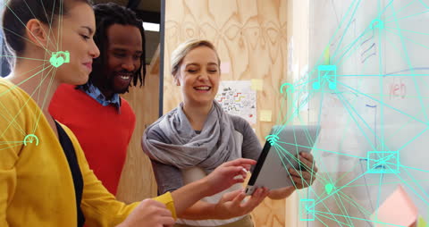 Diverse Team Collaborating with Digital Tablet in Modern Office