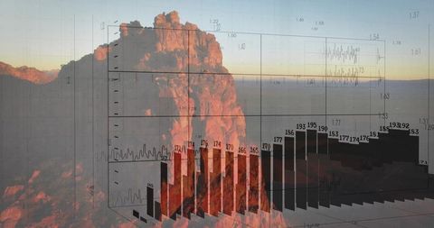 Jagged mountain peak glowing at sunset with 3D bar chart data overlay visualization
